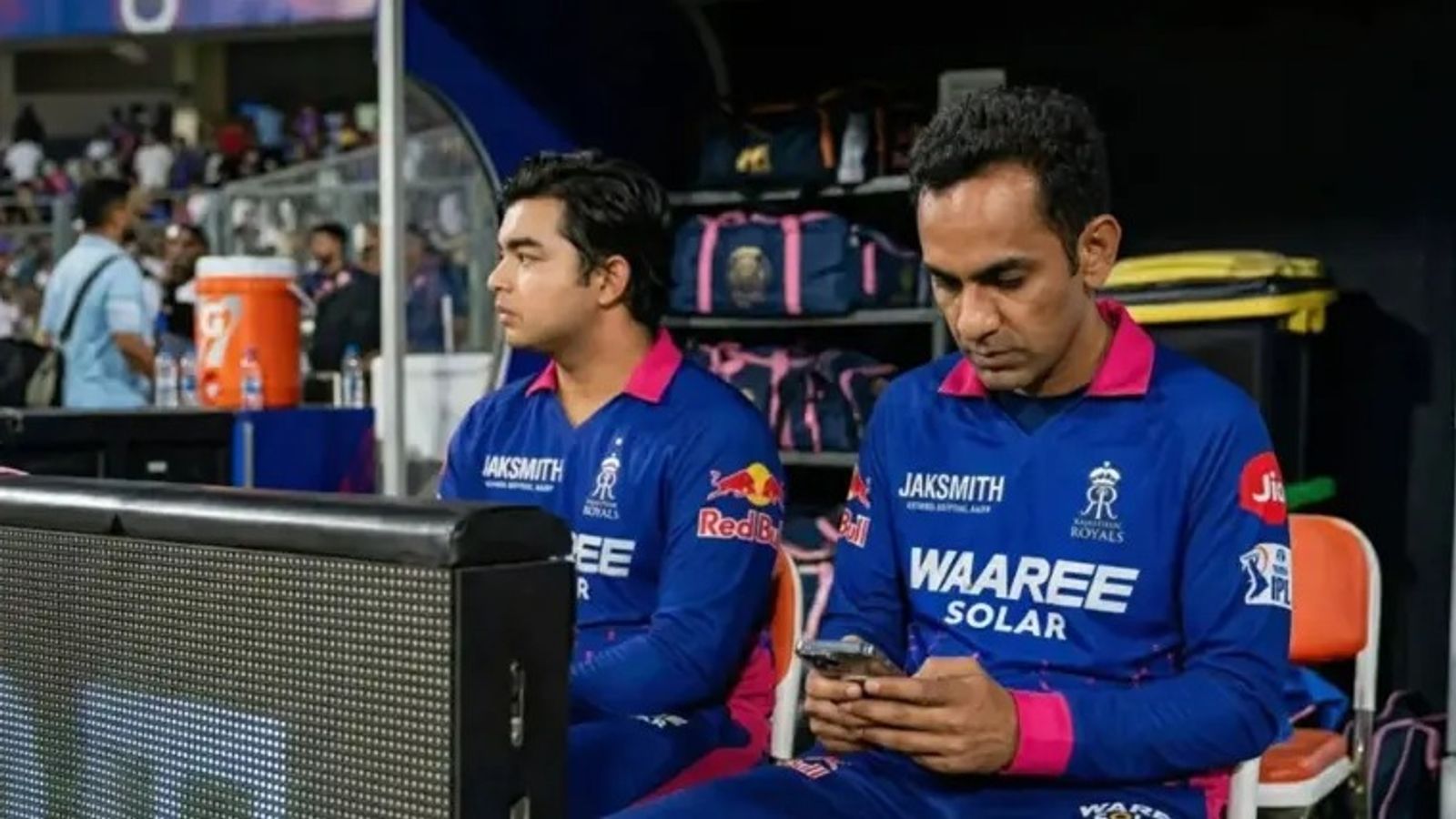 BCCI gives final verdict on RR manager Romi Bhinder over dugout phone row, Vaibhav Sooryavanshi walks free RR's batting prodigy Vaibhav Sooryavanshi (L) and manager Romi Bhinder in frame. (Screenshot)