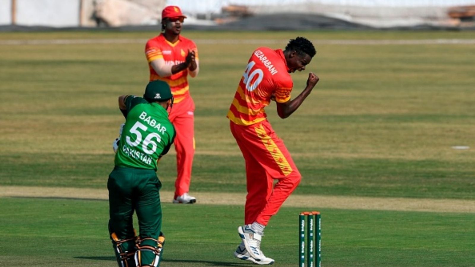 Blessing Muzarabani's agent hits back at PCB over over 2-year PSL ban, says contract was never received from Islamabad United Zimbabwe's Blessing Muzarabani (R) celebrates after dismissing Pakistan's captain Babar Azam (L) during the first ODI match of the series at the Rawalpindi Cricket Stadium in Rawalpindi on October 30, 2020.