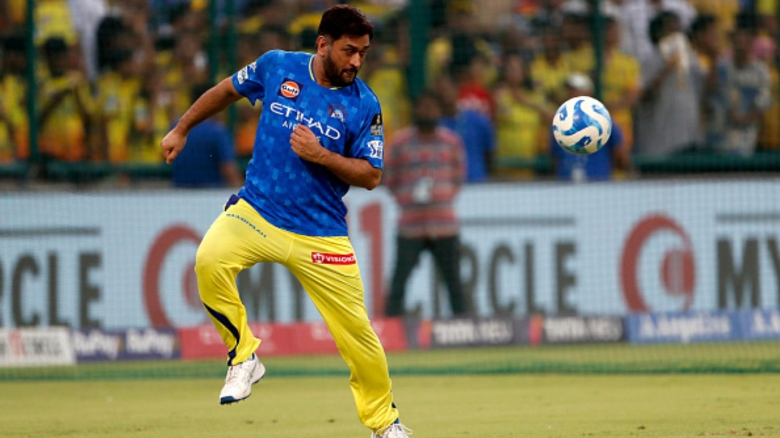 'I don't know when he's going to play, but...': CSK coach Hussey happy with MS Dhoni's batting, hopes quick return MS Dhoni of Chennai Super Kings plays a football during the 2025 IPL match against Rajasthan Royals at Arun Jaitley Stadium on May 20, 2025, in Delhi, India.
