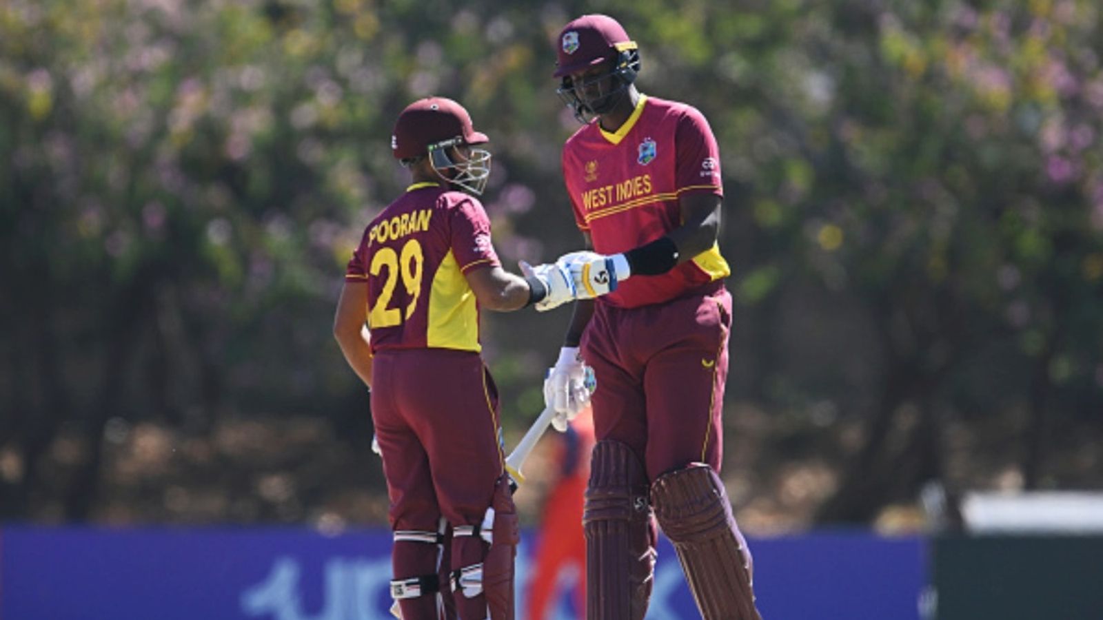 'Try not to panic or get too consumed with...': GT's Jason Holder's advice to LSG's Nicholas Pooran Jason Holder of West Indies shakes hands with teammate Nicholas Pooran during the ICC Men's World Cup Qualifier 2023 match against Netherlands at Takashinga Cricket Club on June 26, 2023 in Harare, Zimbabwe.