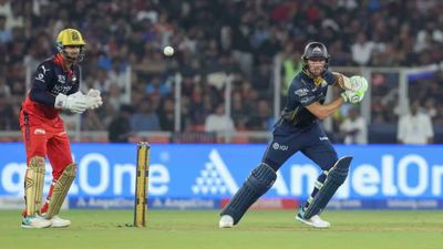 IPL 2026: Gill-Buttler-Arshad's exploits help GT record 5th win after condemning RCB to 4-wicket defeat GT's Jos Buttler (R) plays a shot while RCB's Jitesh Sharma looks on in this frame. (IPL)