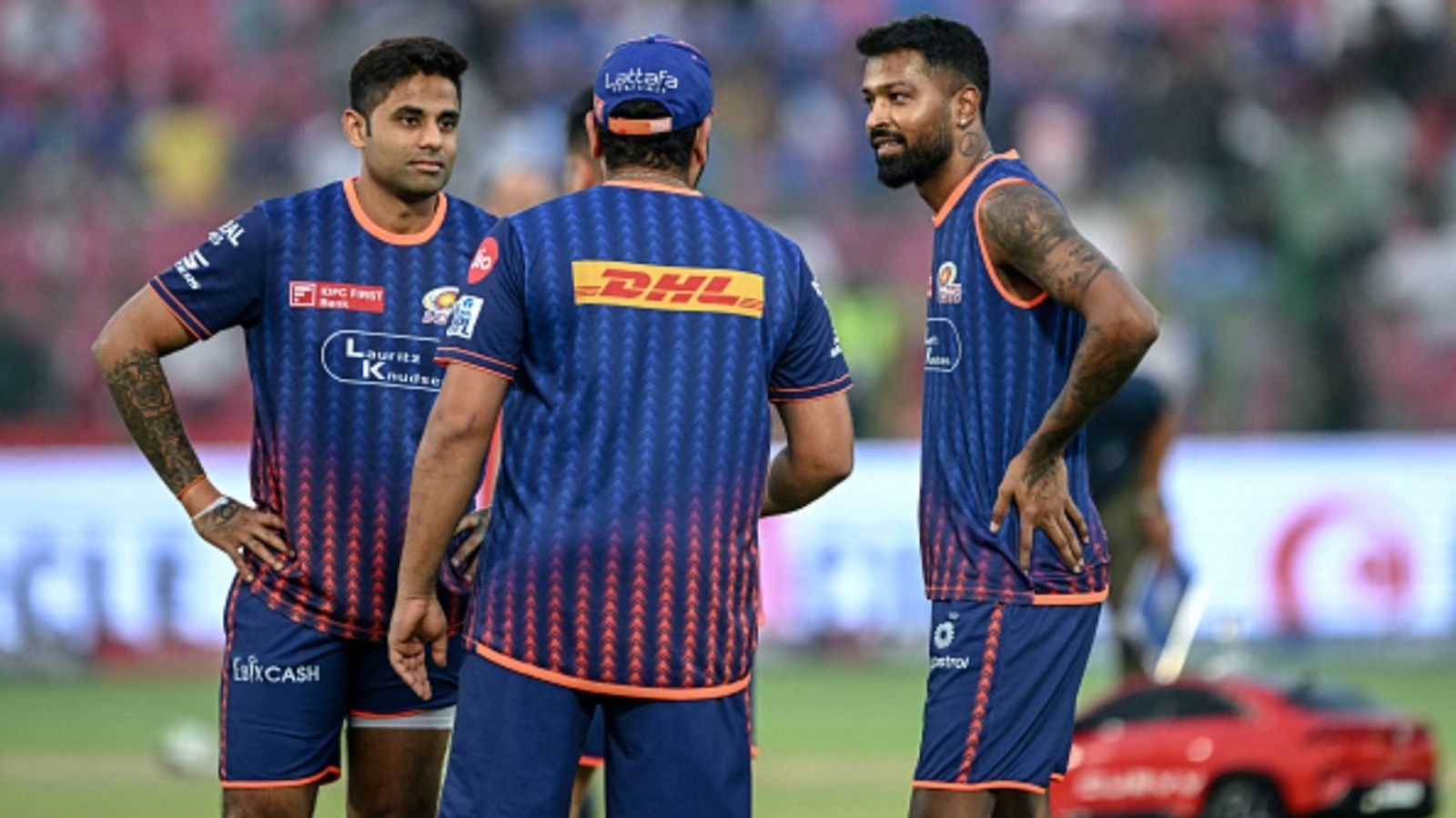 Huge boost for Mumbai Indians, star player available for RCB clash: Report Mumbai Indians' captain Hardik Pandya (R) speaks with teammates Suryakumar Yadav (L) and Rohit Sharma as they warm up before the start of the IPL match against Punjab Kings at the Sawai Mansingh Stadium in Jaipur on May 26, 2025.