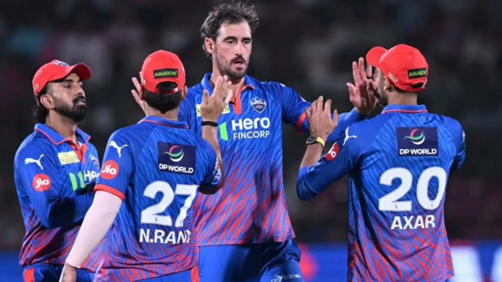 Nightmare for Mitchell Starc, endures his worst spell In IPL history after getting belt treatment from PBKS batters DC's star pacer Mitchell Starc (C) celebrates with his teammates in this frame. (Screenshot)