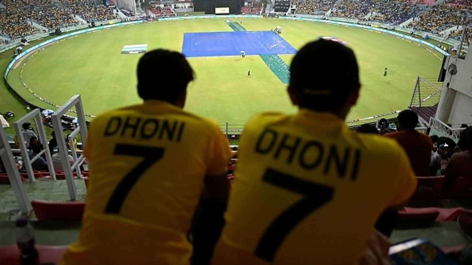 MS Dhoni to finally make 1st IPL 2026 appearance? CSK CEO says flight booked for... Spectators wearing Chennai Super Kings' MS Dhoni's jerseys as they wait for the match to resume after rain stops the play during the IPL match against Lucknow Super Giants at the Ekana Cricket Stadium in Lucknow on May 3, 2023.