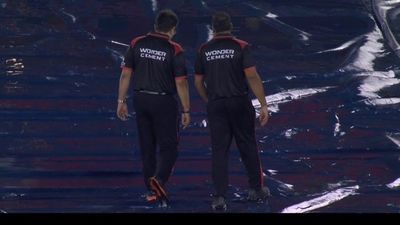 IPL 2026: Cut-off timings revealed after rain delays toss at RCB vs KKR clash Onfield umpires evaluating the venue. (Screengrab)