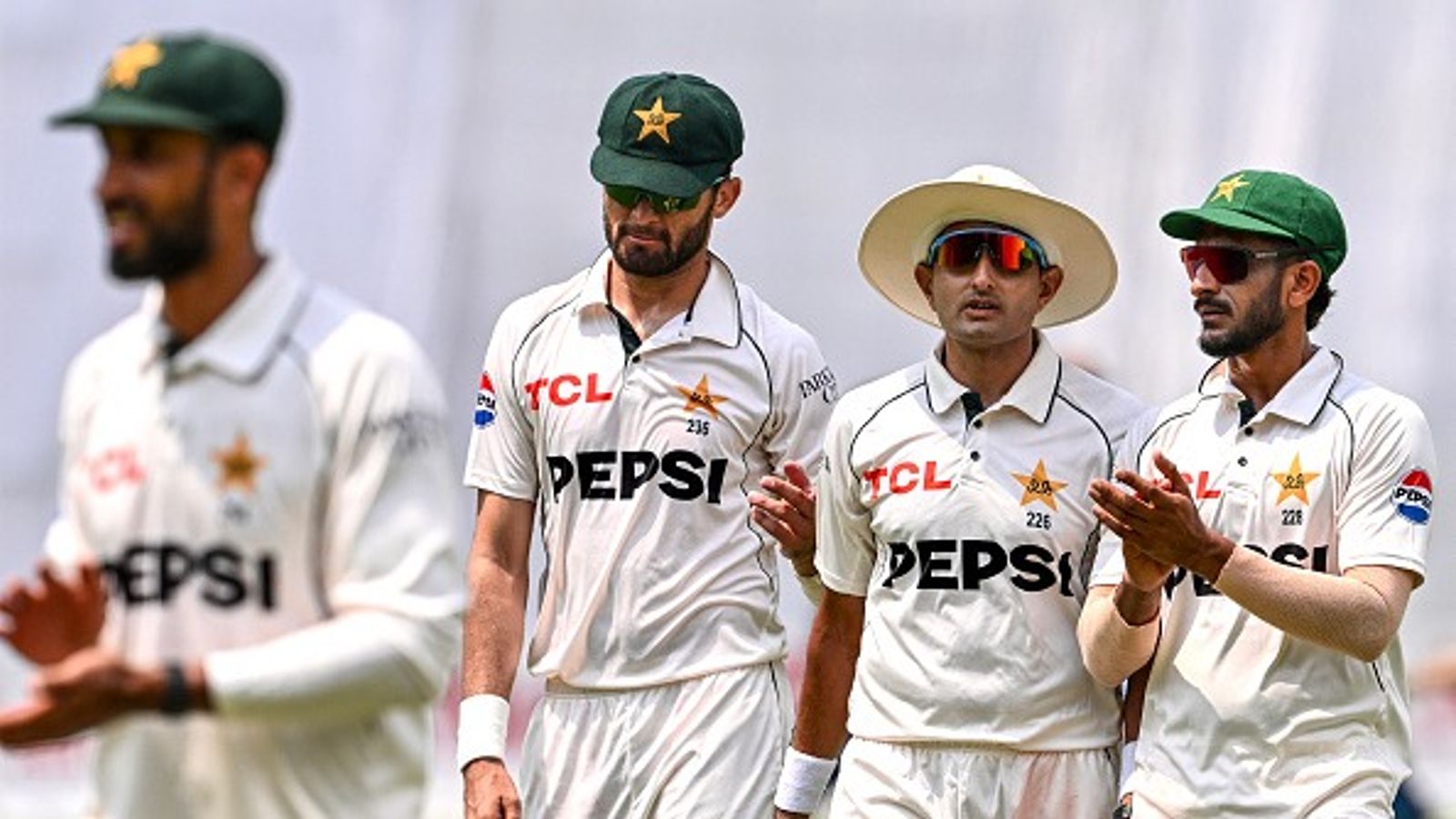 Double disaster for Pakistan, gets slapped with ICC's hefty fine; then suffers WTC jolt Pakistan's Mohammad Abbas (2R) along with teammates Shaheen Shah Afridi (2L) and Hasan Ali (R) in this frame. (Getty)