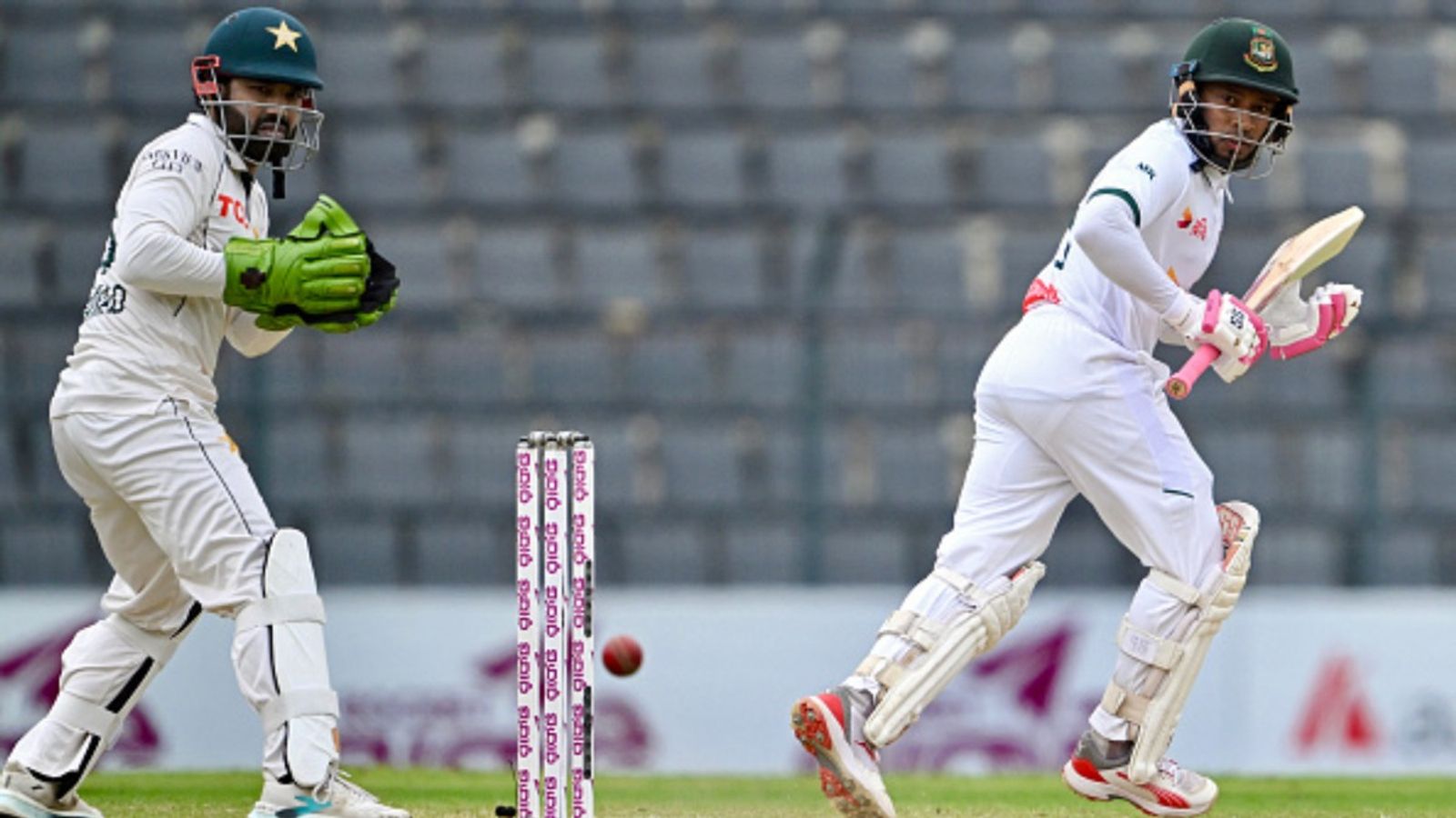 BAN vs PAK: Mushfiqur Rahim's 137 puts Bangladesh on driver's seat in 2nd Test, hand Pakistan 437-run target Bangladesh's Mushfiqur Rahim (R) plays a shot as Pakistan's Mohammad Rizwan looks in in this frame. (Getty)