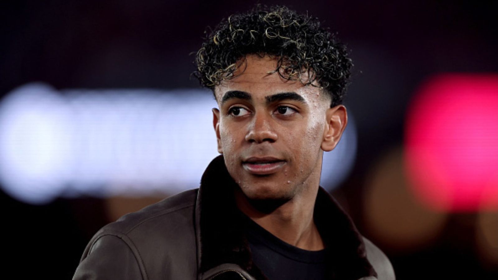 Watch: Barcelona star Lamine Yamal spotted on vacation with rumored new girlfriend Lamine Yamal in the frame (Image via Getty)