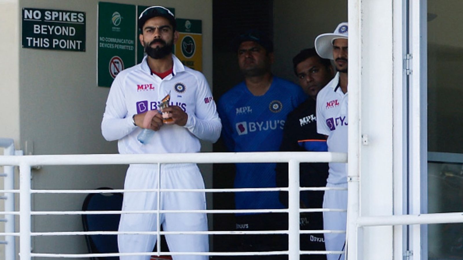 'I ended up being in a place where...': After 4 years, Virat Kohli reveals why he left Test captaincy India's Virat Kohli (L) is seen with a bandage on his right hand during the first day of the third Test against South Africa at Newlands stadium in Cape Town on January 11, 2022.
