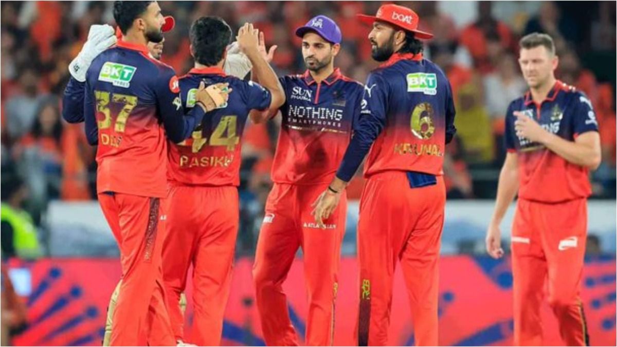 Royal Challengers Bengaluru players celebrate with each other. (Screenshot) Royal Challengers Bengaluru players celebrate with each other. (Screenshot)