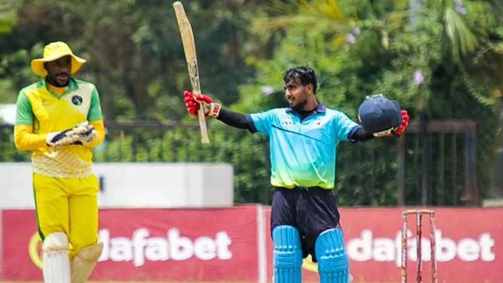 28-yr-old opener scores 2nd highest score in T20I history, team wins by 271 runs Rwanda's Hamza Khan celebrates his century against Ivory Coast on May 24.