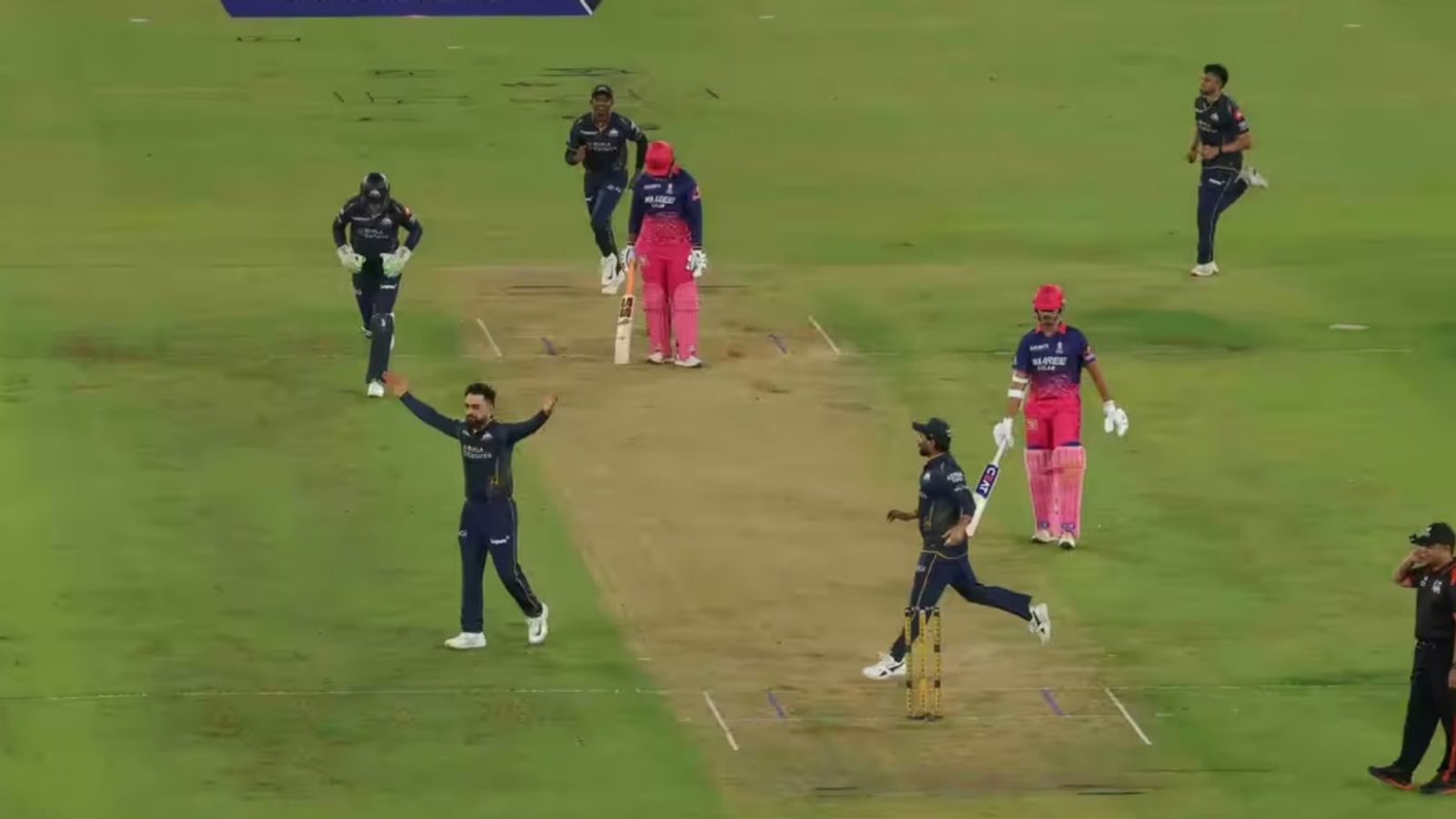 'I'm not sitting in pre-show of Star Sports': GT coach tight-lipped on plans against Vaibhav Sooryavanshi for Qualifier 2 GT's Rashid Khan celebrates with his teammates after dismissing RR opener Vaibhav Sooryavanshi in IPL 2026. (Photo Credit: BCCI)