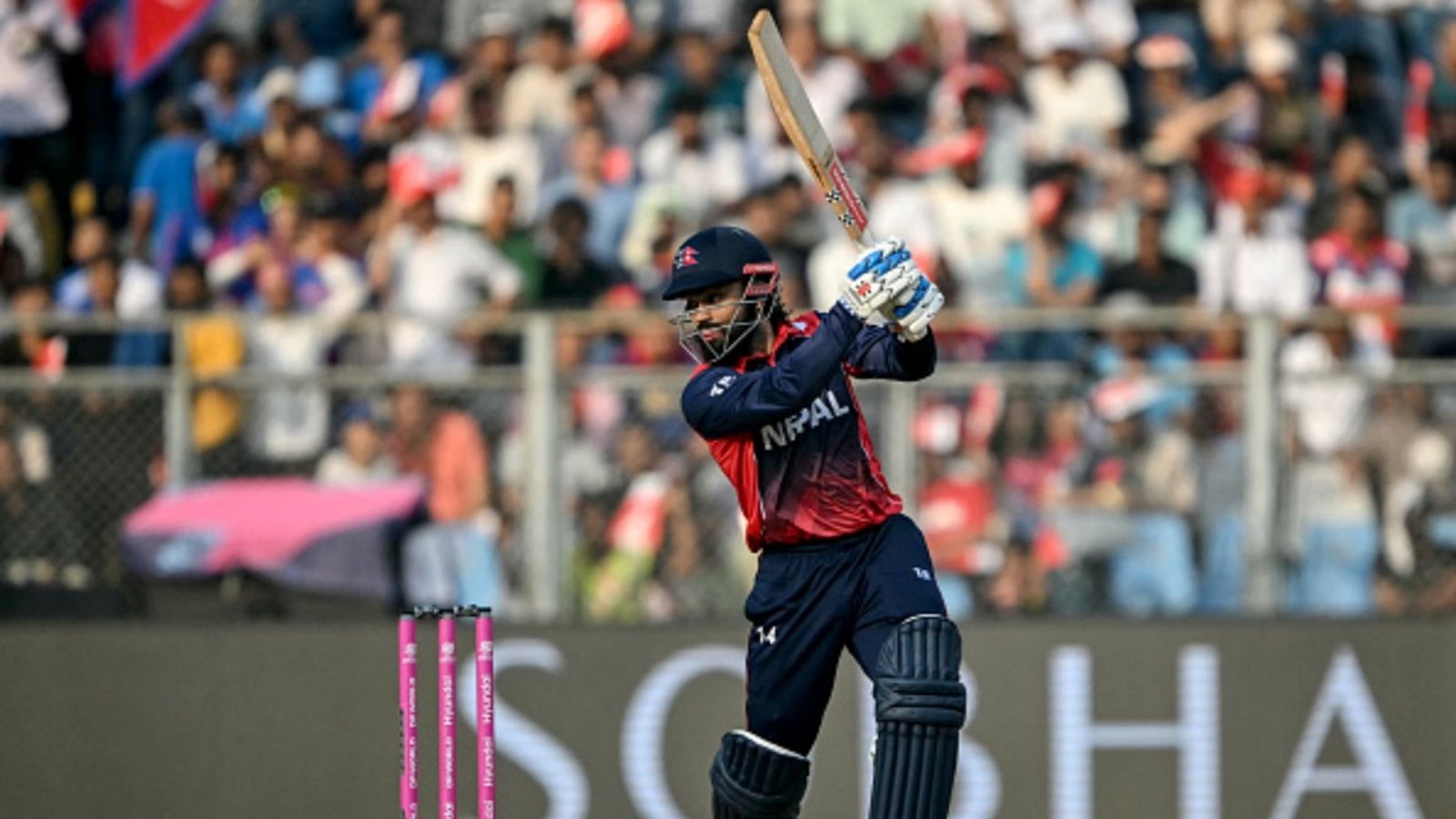Nepal batters smash 29 sixes to post 313, beat China by 221 runs in Asian Games T20 Qualifiers Nepal's Kushal Bhurtel plays a shot during the 2026 ICC Men's T20 Cricket World Cup group stage match against England at the Wankhede Stadium in Mumbai on February 8, 2026. (File Photo: Getty)