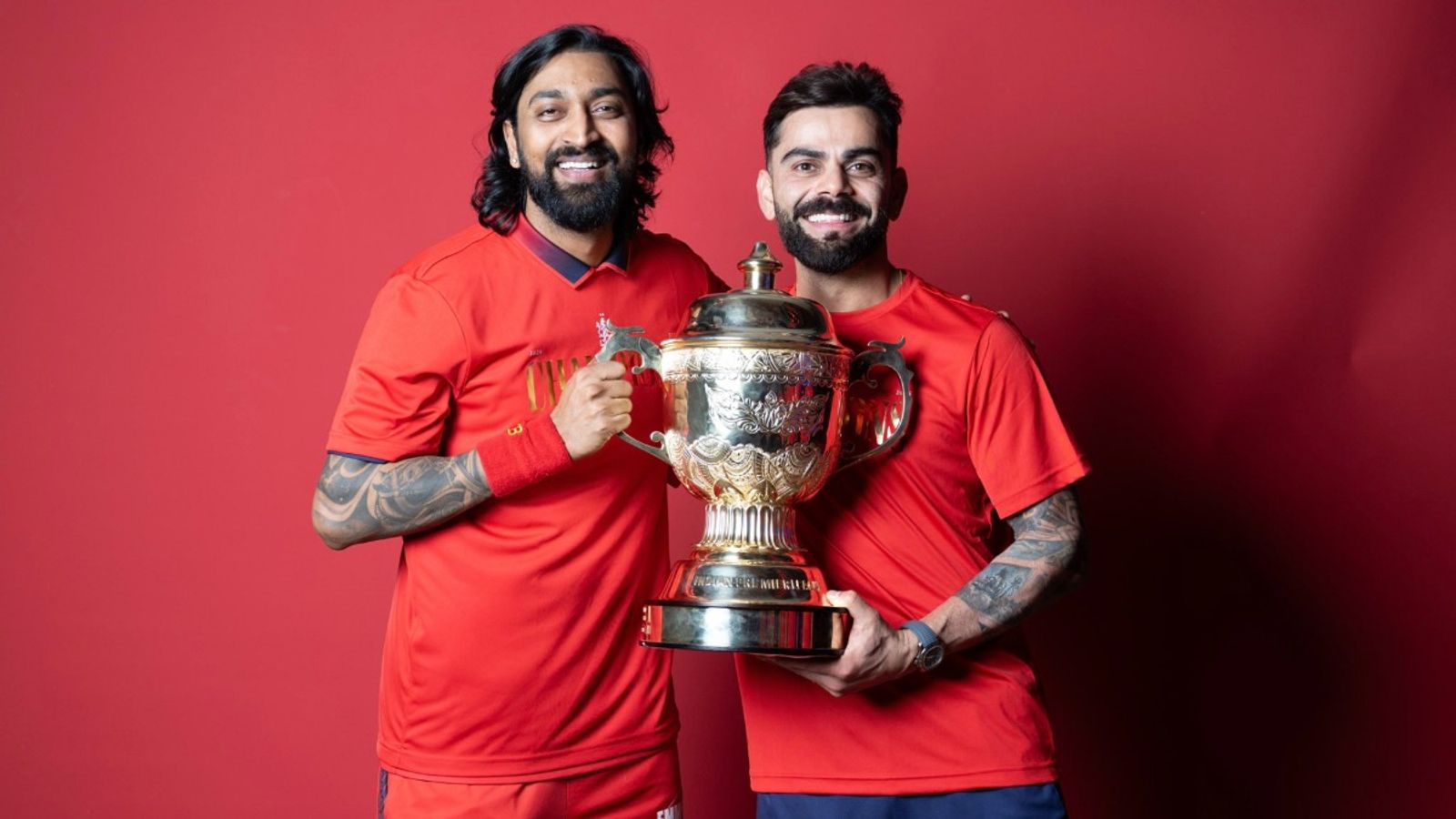 Virat Kohli shows off special RCB tribute T-shirt after historic IPL 2026 triumph, says 'Here we are again' Krunal Pandya and Virat Kohli in this frame. (X)