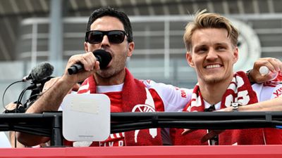 Watch: Arsenal star Martin Ødegaard's parade header goes wrong; lands on policeman Watch: Arsenal star Ødegaard's parade header goes wrong; lands on policeman
