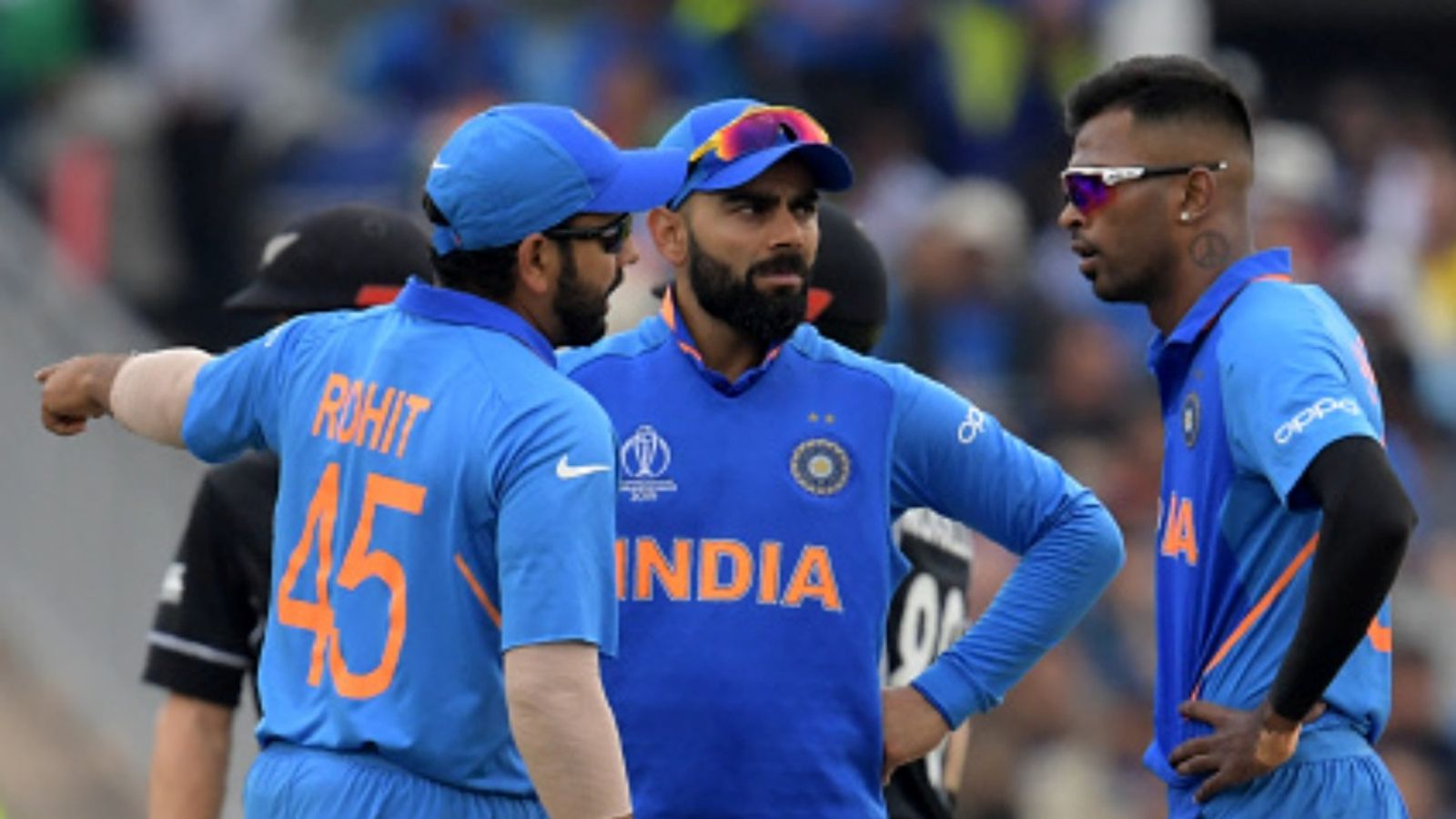 New Zealand announce all-format schedule for India series spanning over 5 weeks in 2026, 2 more ODIs for Ro-Ko India's captain Virat Kohli (C) speaks with teammates Hardik Pandya (R) and Rohit Sharma (L) during the 2019 World Cup first semi-final at Old Trafford in Manchester, on July 9, 2019.