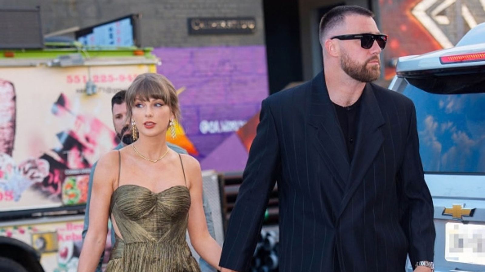 Taylor Swift & Travis Kelce's shocking secret Madison Square Garden wedding; A look at their jaw-dropping long-guest details Taylor Swift and Travis Kelce in the frame (Image via Getty)