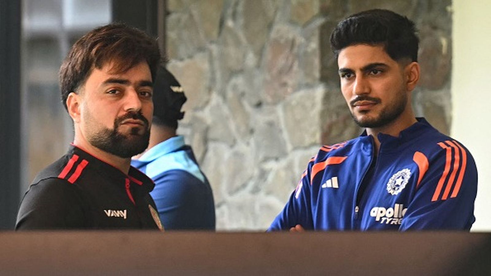 India vs Afghanistan 1st ODI's toss and start time revealed for 25-overs per side game Afghanistan's Rashid Khan (L) stands alongside India's captain Shubman Gill in this frame. (Getty)