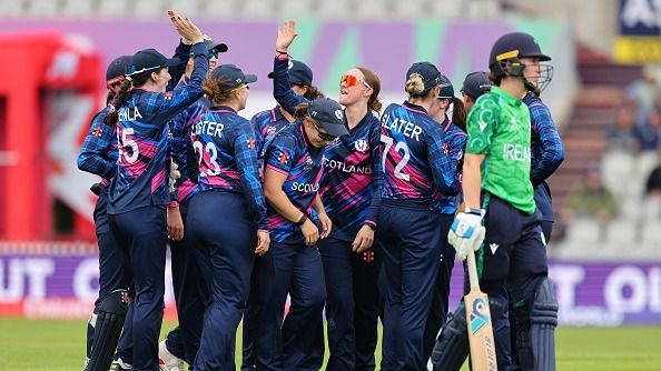Scotland's Katherine Fraser celebrates with her teammates after dismissing Ireland's Leah Paul in this frame. (Getty)
