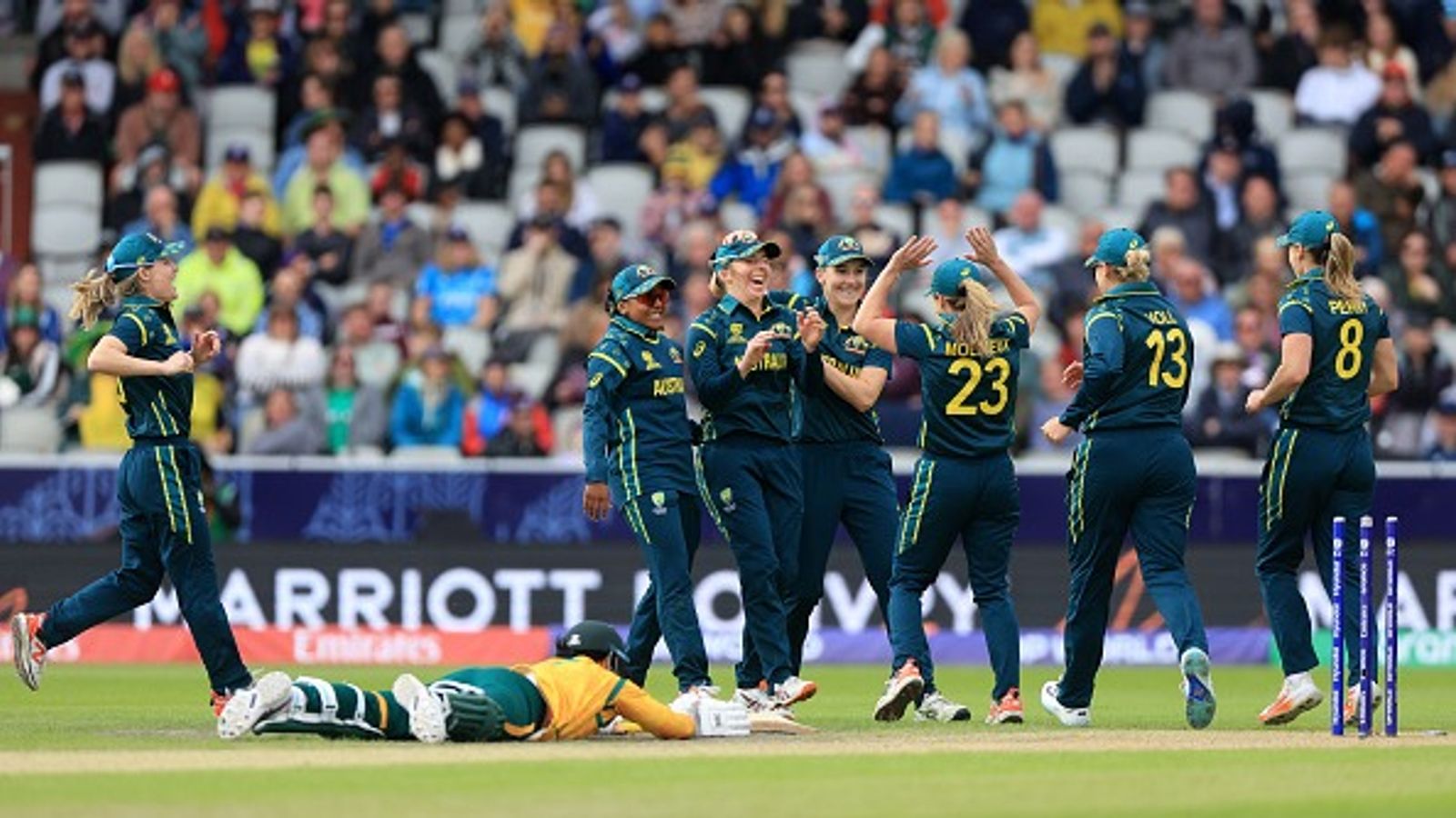 Women's T20 World Cup: Wareham's all-round gem steers Australia to 65-run win over SA in campaign opener Australia's Georgia Wareham (centre left) celebrates with team-mates after running out South Africa's Marizanne Kapp (on ground) during Women's T20 World Cup 2026 clash. (Getty)