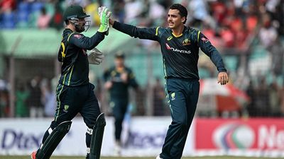 BAN vs AUS: Australia spin web around Bangladesh to record four-wicket win in first T20I Australia's Joel Davies (R) celebrates with wicketkeeper Josh Inglis in this frame. (Getty)