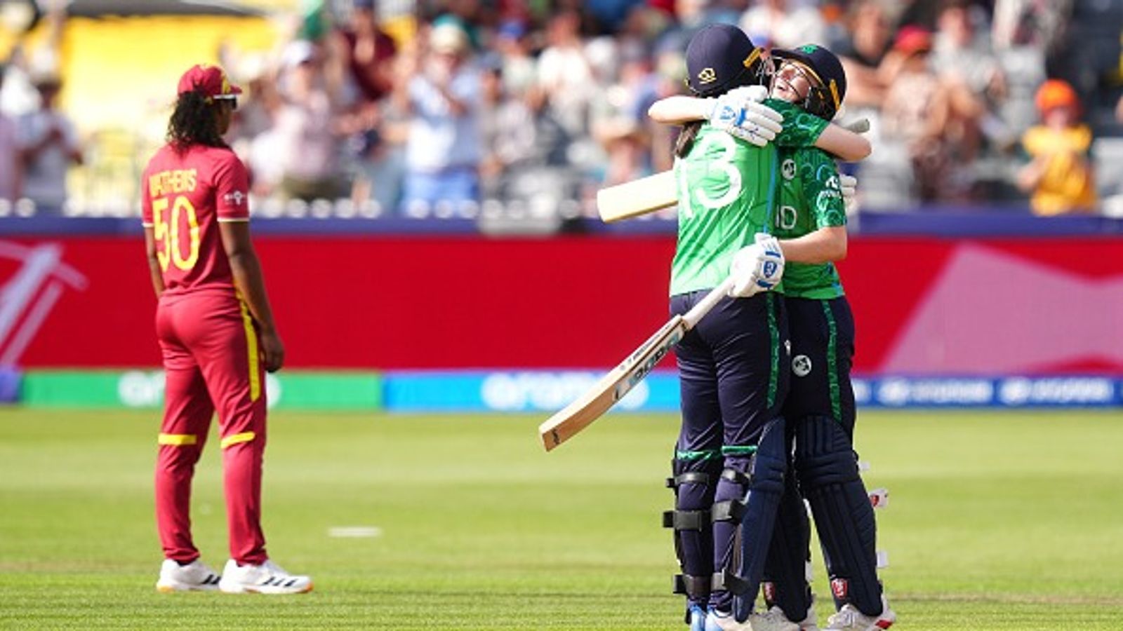 Ireland shock West Indies by 6 wickets with historic first-ever Women's T20 World Cup win Ireland's Rebecca Stokell and Louise Little (right) celebrate after beating West Indies in their Women's T20 World Cup. (Getty)