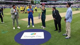 Australia skipper Sophie Molineux (3rd from R) flips the coin as India captain Harmanpreet Kaur (2nd from L) takes the call in this frame. (Getty) Australia skipper Sophie Molineux (3rd from R) flips the coin as India captain Harmanpreet Kaur (2nd from L) takes the call in this frame. (Getty)