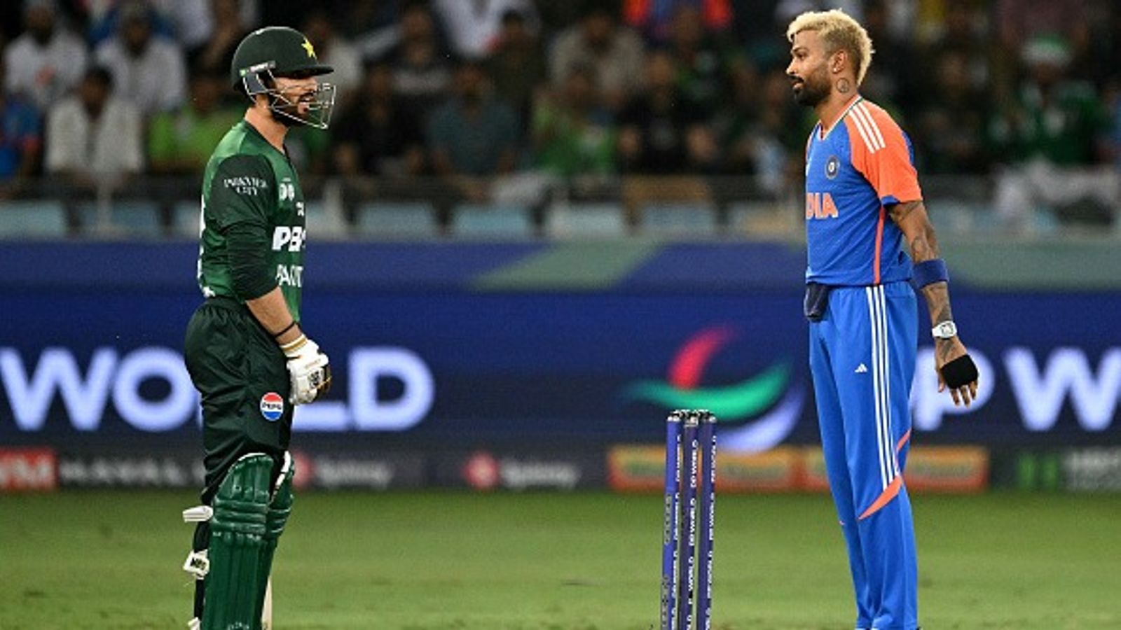 Pakistan coach shows Men in Green the mirror, says 'India are the best team by a mile' India's Hardik Pandya (R) looks at Pakistan's Salman Agha in this frame. (Getty)