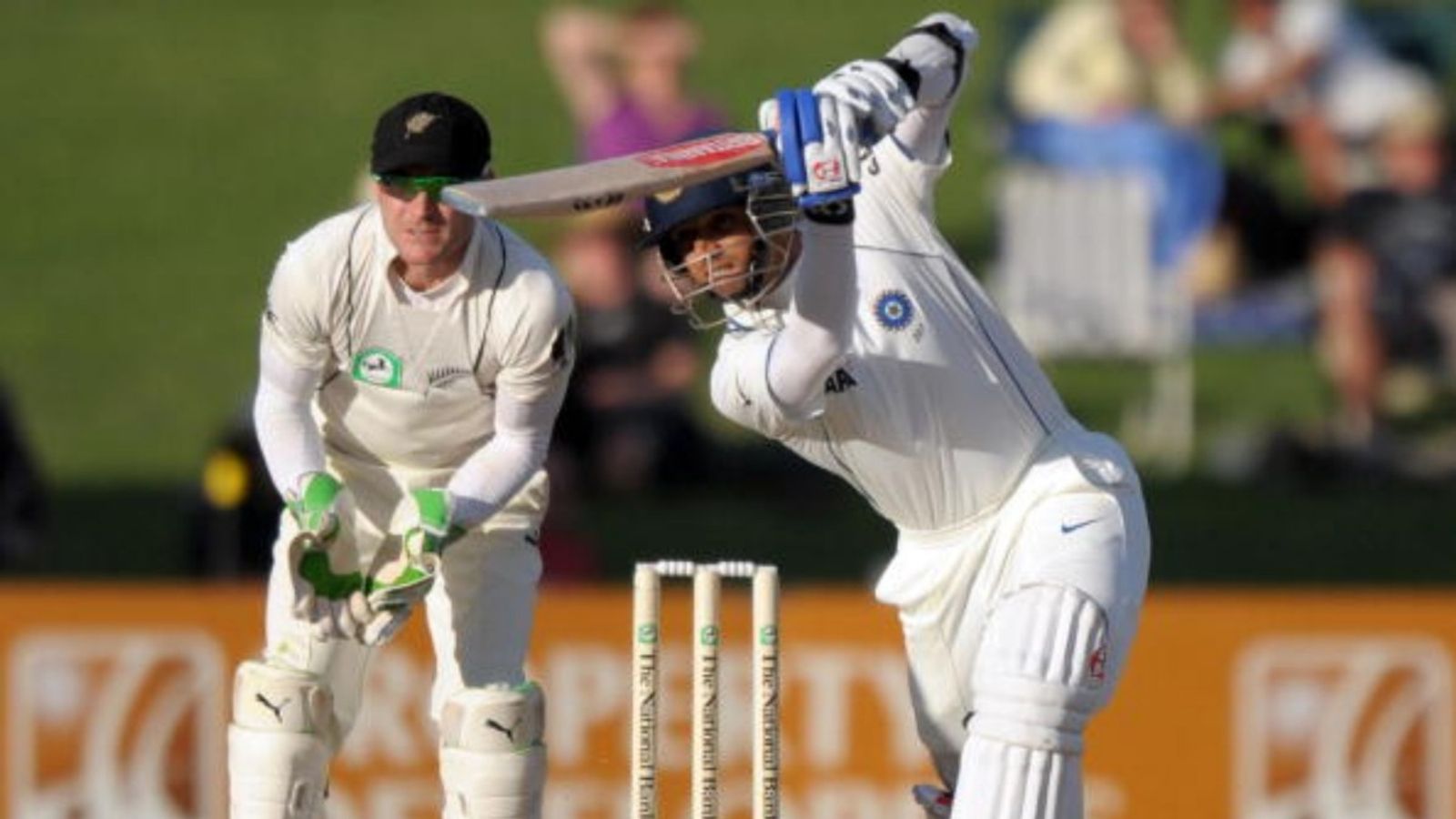 From New Zealand's bad boy to India's nice guy? Rahul Dravid among contenders to coach England's Test side: Report Indian crickter Rahul Dravid (R) plays a shot as New Zealand wickekeeper Brendon McCullum (L) looks on during the third day of the second Test at McLean Park in Napier on March 28, 2009.