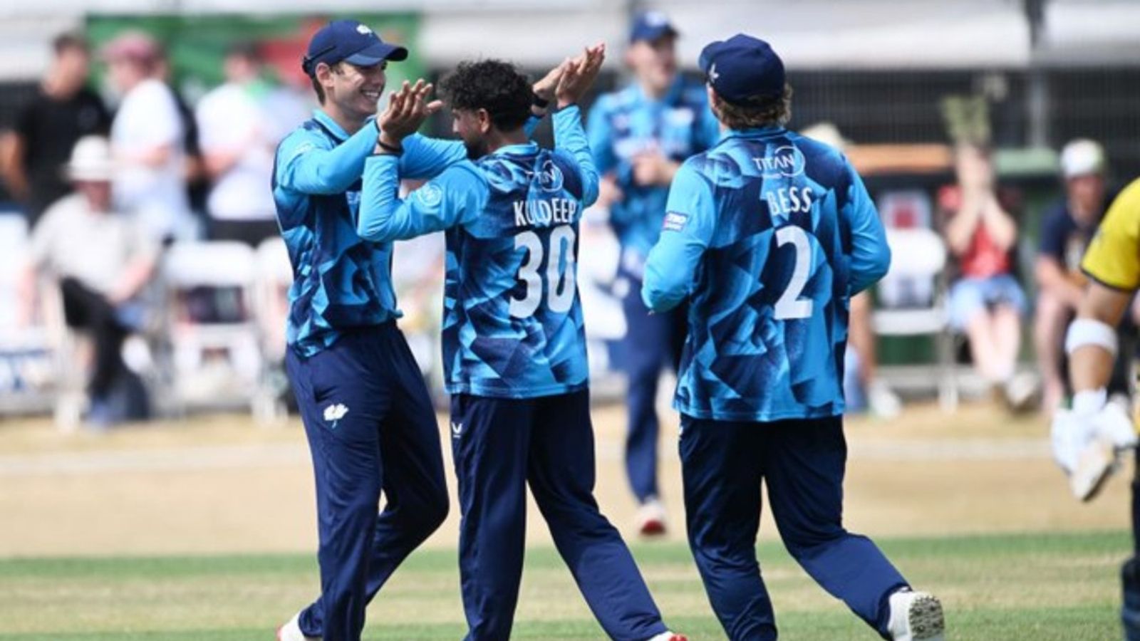 India's ace spinner runs riot in England, snaps up two wickets in three balls for this team Kuldeep Yadav (C) celebrates with his Yorkshire teammates in this frame. (Getty)