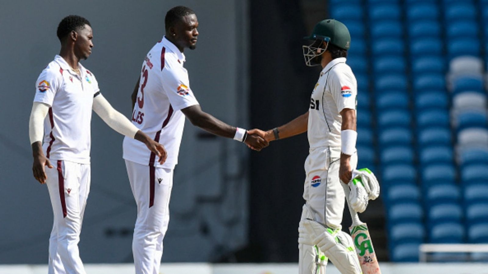 Pakistan bowled out for 120, lose 1st Test to West Indies by 90 runs in Babar's 1st game on return as captain Pakistan captain Babar Azam (R) congratulates West Indies bowler Jayden Seales (C) and Shamar Joseph for their 90-run victory during the fourth day of the first Test at the Brian Lara Cricket Academy in Tarouba, Trinidad and Tobago,.