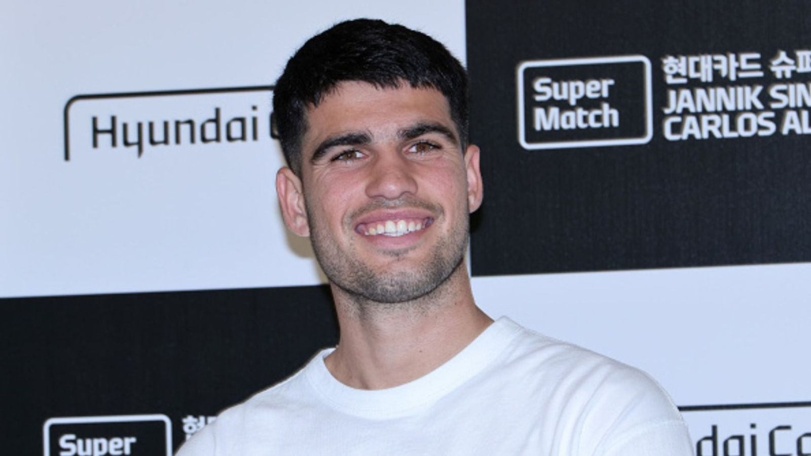 Watch: Tennis star Carlos Alcaraz debuts bold hairstyle ahead of US Open return Carlos Alcaraz in the frame (Image via Getty)
