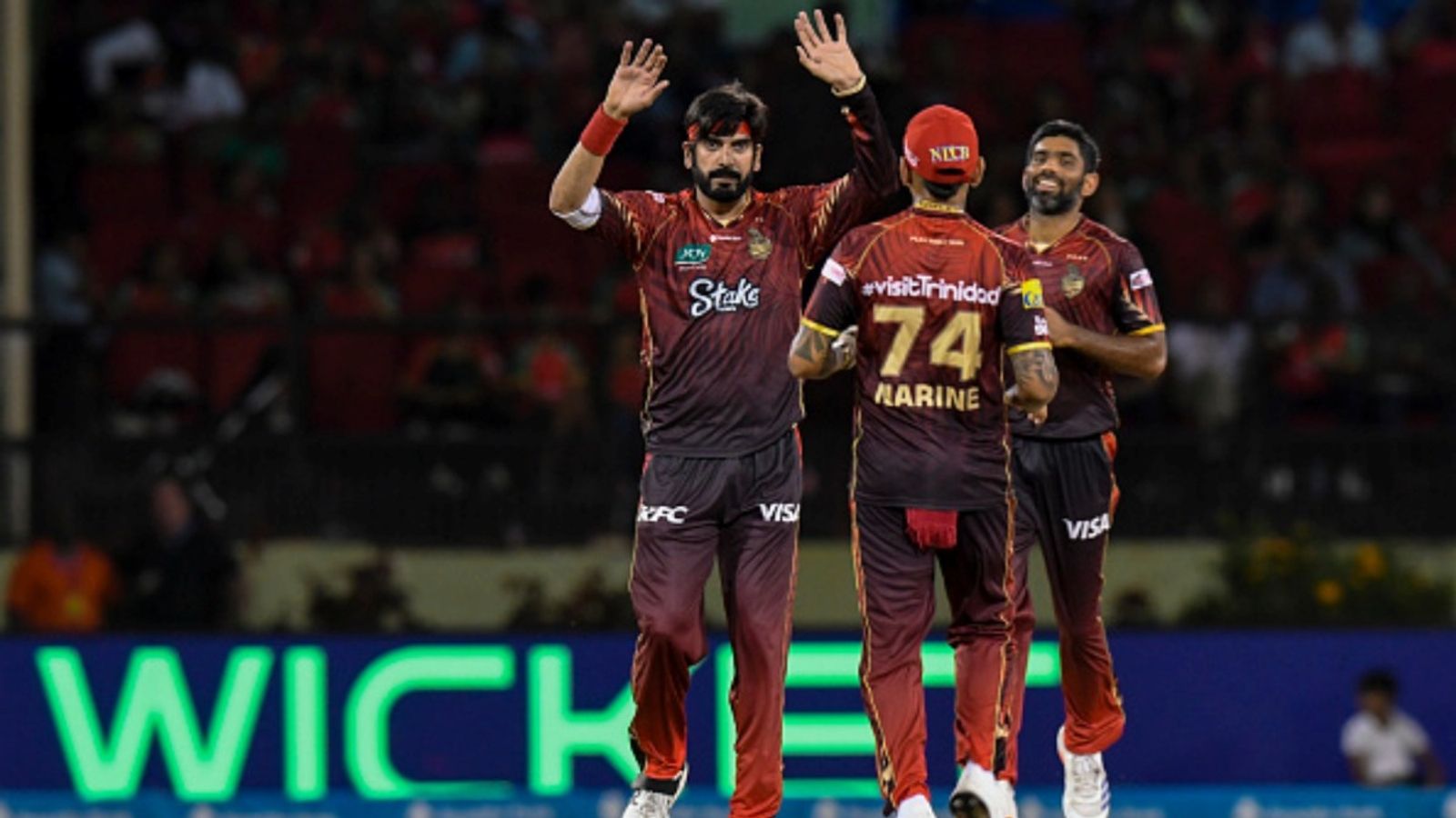 'They're only doing this because they can't pick you': PAK's Tariq recalls Narine's support during bowling action controversy Usman Tariq (L) and Saurabh Netravalkar (R) of Trinbago Knight Riders celebrate the dismissal of Moeen Ali of Guyana Amazon Warriors during the Men's 2025 CPL Final match at Guyana National Stadium on September 21, 2025 in Providence, Guyana.