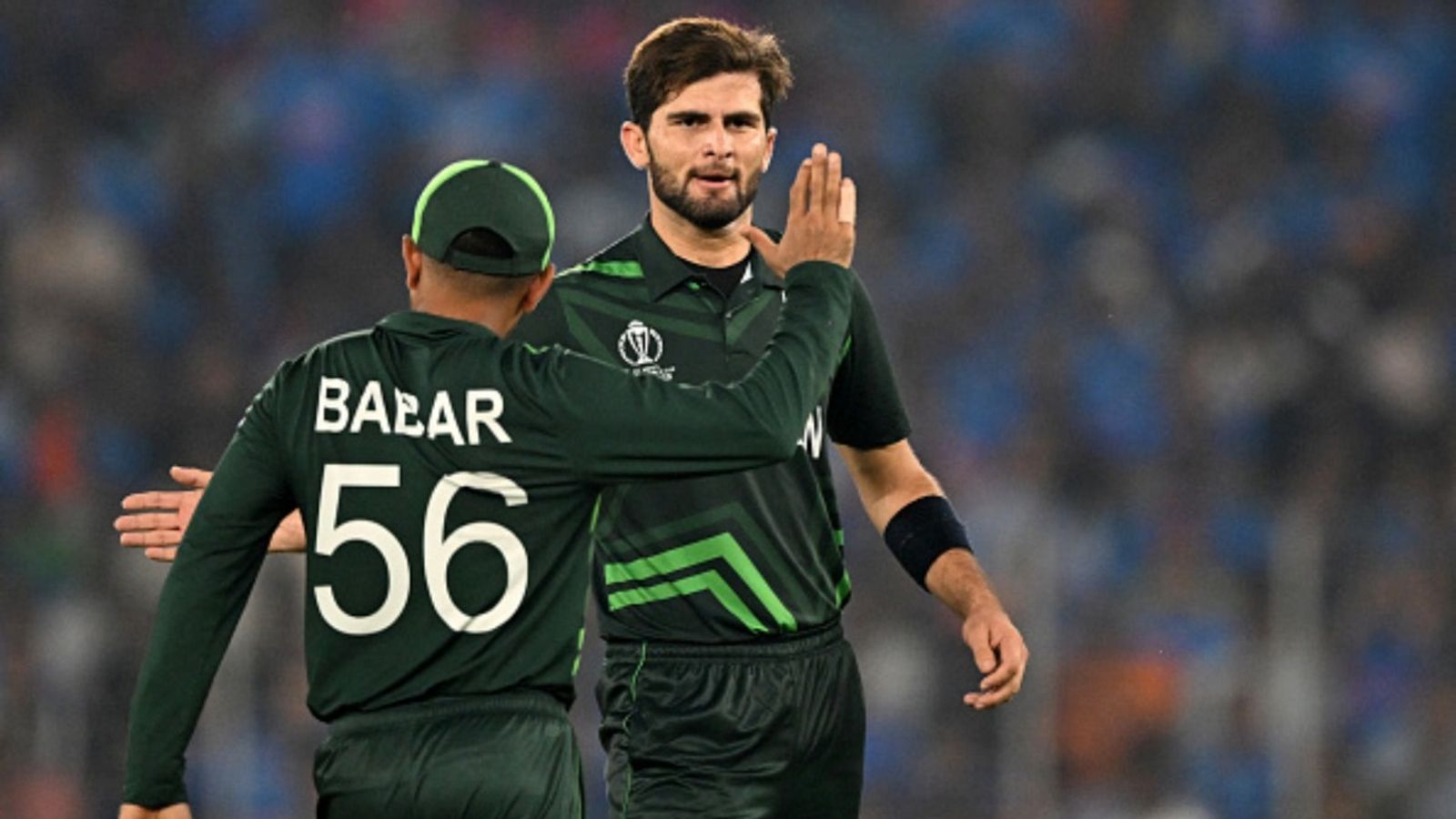 Shaheen Afridi breaks silence on rumours of Babar Azam taking over as captain ahead of ODI World Cup 2027 Pakistan's Shaheen Shah Afridi (R) celebrates with his team captain Babar Azam after taking the wicket of India's captain Rohit Sharma during the 2023 ICC Men's World Cup ODI match at the Narendra Modi Stadium in Ahmedabad on October 14, 2023.
