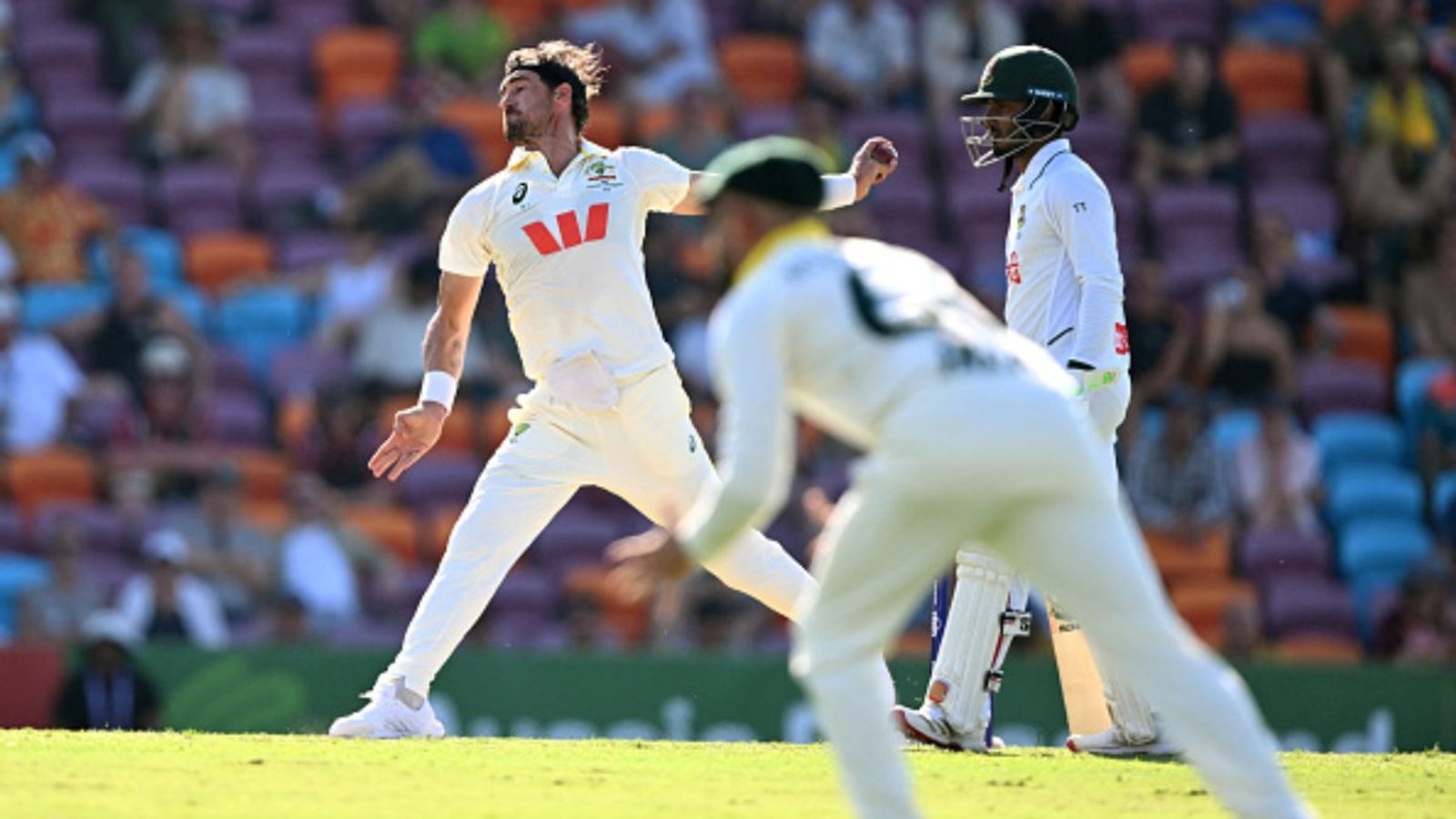 Mitchell Starc breaks ex-Sri Lanka captain's all-time Test record with just 1 wicket vs Bangladesh in 1st Test Australia's Mitchell Starc (L) sends down a delivery on the first day of the first Test against Bangladesh at Marrara Stadium in Darwin on August 13, 2026.