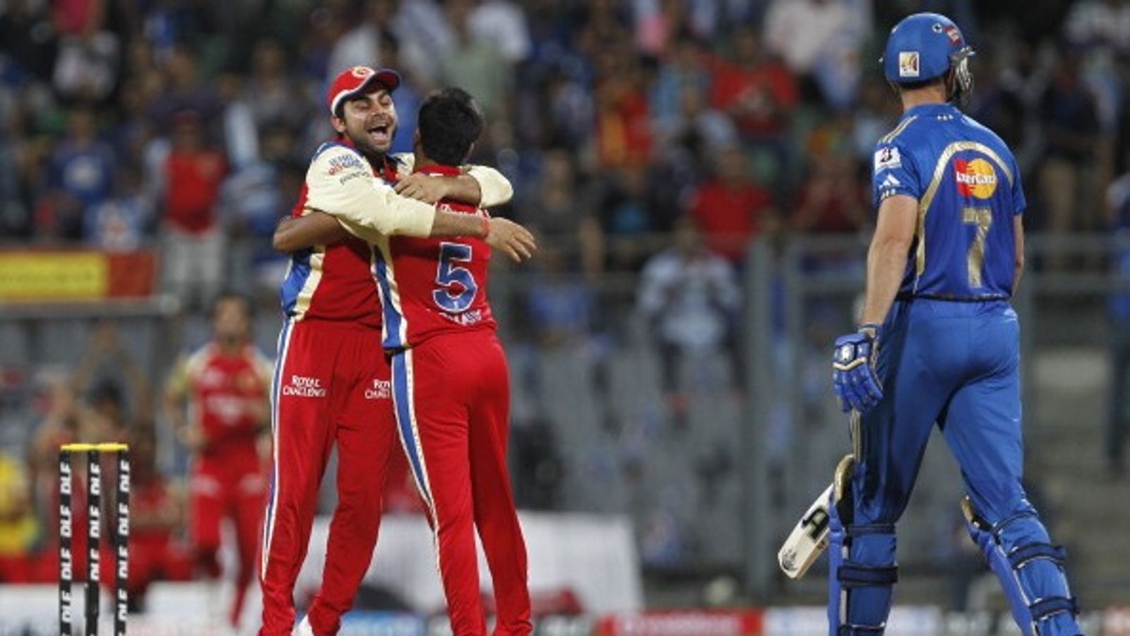 Virat Kohli's former RCB teammate appointed KL Rahul's team's head coach File Photo: Former RCB pacer Vinay Kumar celebrates with Virat Kohli (L) in this frame. (Getty)