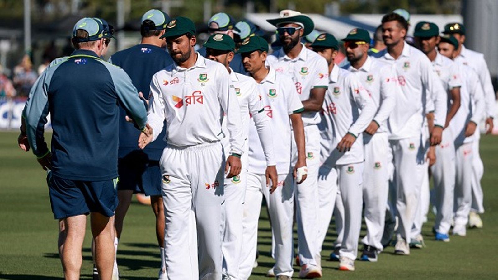 WTC Updated Points Table: Good news for India from Australia, Bangladesh's loss makes Gill's team's rise to no.4 simple Bangladesh's captain Najmul Hossain Shanto (2nd L) and his team mates shake hands with players and staff from Australia after the second day of the second Test at the Great Barrier Reef Stadium in Mackay on August 23, 2026.