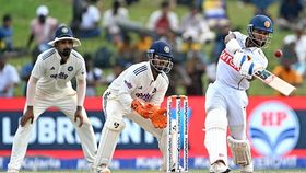 Sri Lanka's Sonal Dinusha (R) plays a shot as India's KL Rahul (L) and Rishabh Pant (C) look on. (Getty) Sri Lanka's Sonal Dinusha (R) plays a shot as India's KL Rahul (L) and Rishabh Pant (C) look on. (Getty)