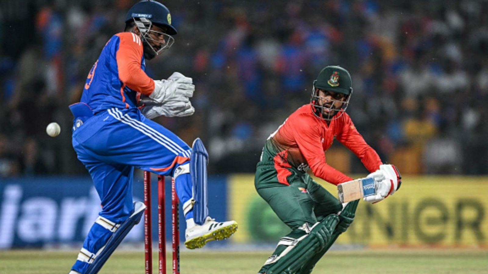 Dropped from squad for Asian Games, Bangladesh all-rounder to make CPL debut as Mohammad Nabi's replacement Bangladesh's Mehidy Hasan Miraz plays a shot as India's Sanju Samson (L) watches during the first T20I at the Shrimant Madhavrao Scindia Cricket Stadium in Gwalior on October 6, 2024.