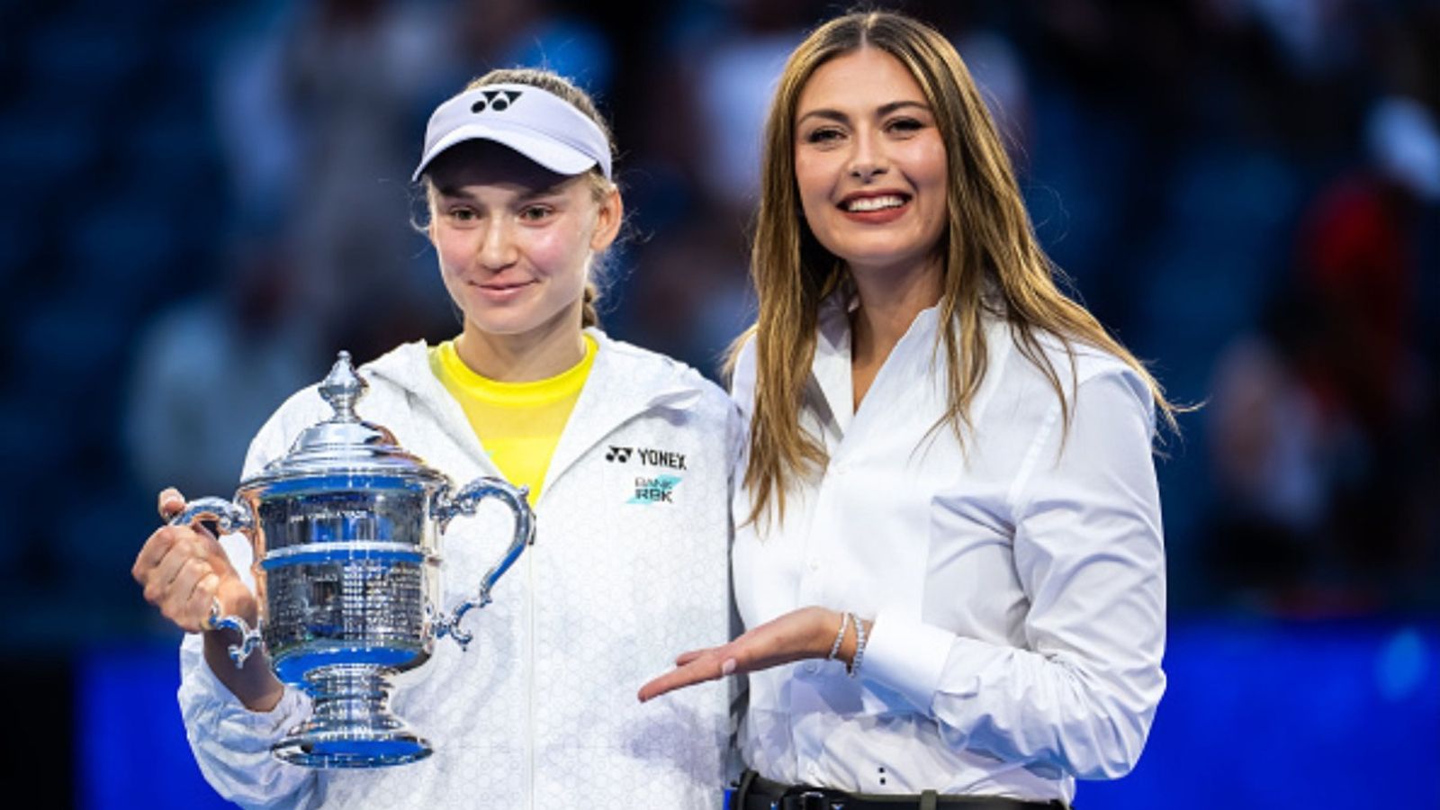 No. 1 Rybakina wins 2026 US Open, breaks No. 2 Sabalenka's three-peat dream; Maria Sharapova hands over trophy Elena Rybakina and Maria Sharapova in the frame (Image via Getty)