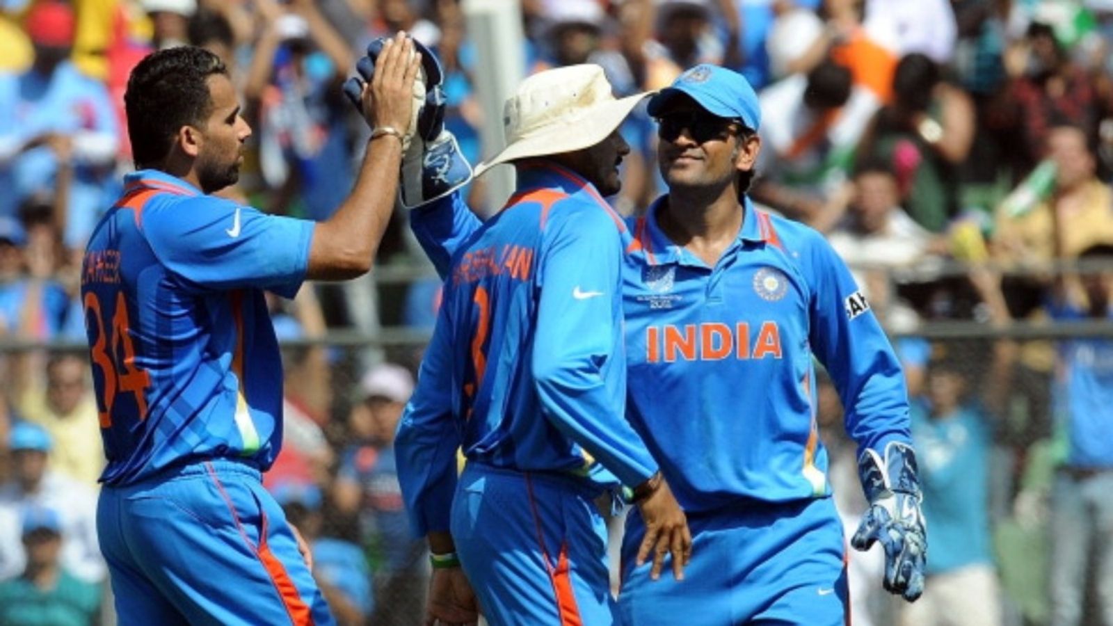 CSK name India's legendary bowler as head coach who won World Cup 2011 under MS Dhoni's leadership Indian bowler Zaheer Khan (L) celebrates the wicket of Sri Lankan batter Upul Tharanga with captain MS Dhoni (R) and Harbhajan Singh (C) during the ICC World Cup final at The Wankhede Stadium in Mumbai on April 2, 2011.