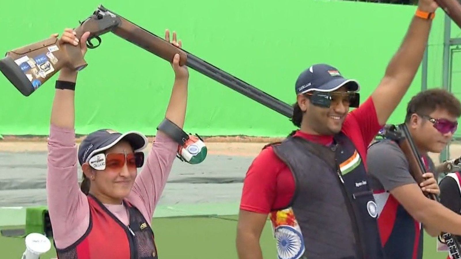 Gold rush continues! Neeru-Kynan break Asian record to beat Qatar in final despite slow start Neeru Dhanda, Kynan Chenai after winning a gold medal in trap mixed team shooting event at Asian Games 2026.