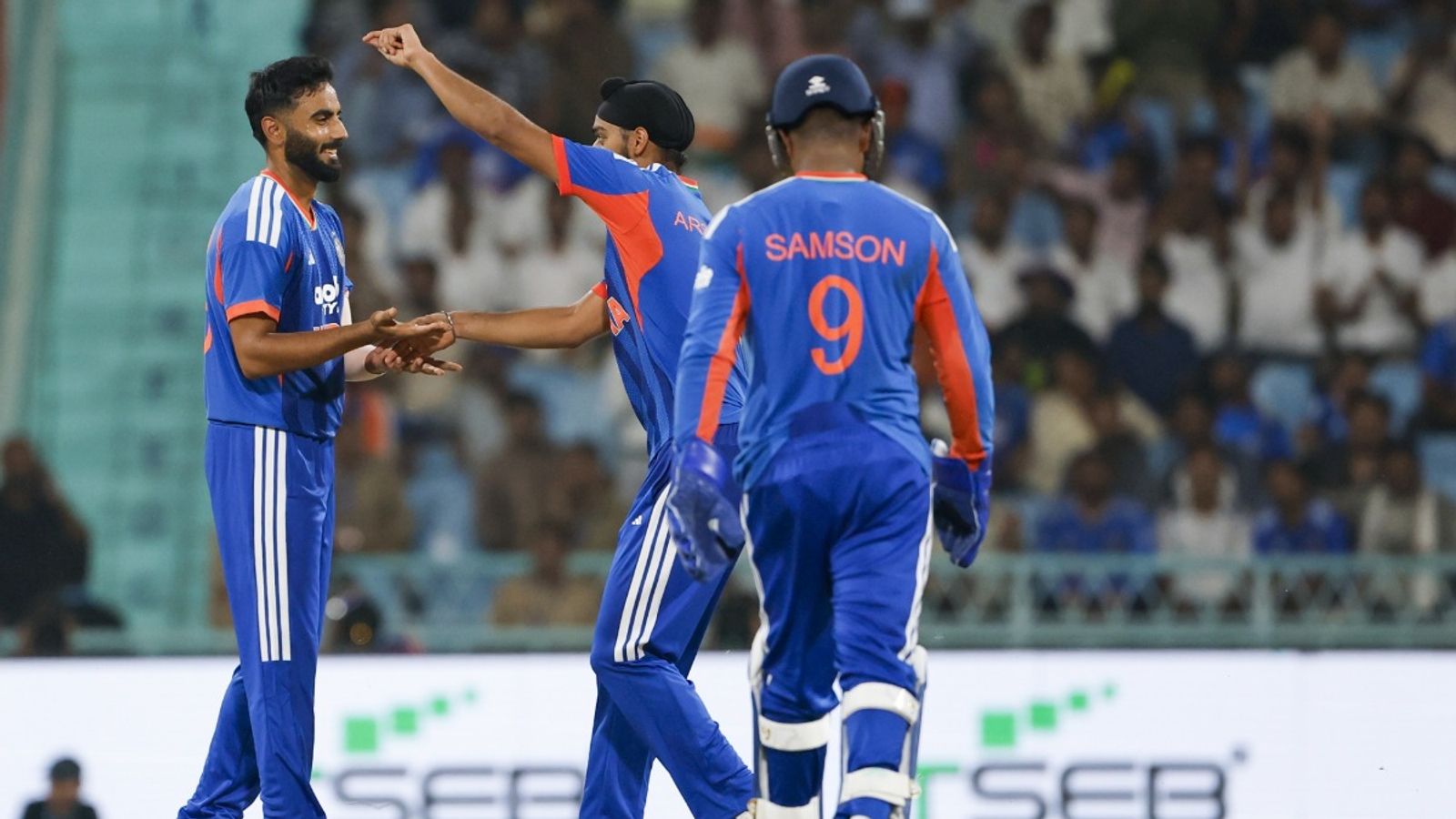 Naman Dhir shows what IPL's 'impact player' rule has stolen from Indian cricket in 4 years India's Naman Dhir celebrates a wicket in the first T20I against West Indies with teammates with Arshdeep Singh and Sanju Samson at Ekana Stadium, Lucknow, on October 6.