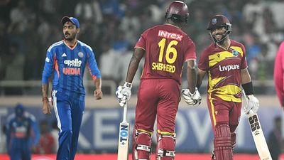 IND vs WI: Hope's explosive ton triggers WI's highest T20I chase to stun India by 6 wickets in 2nd ODI West Indies captain Shai Hope (R) shakes hands with teammate Romario Shepherd (C) after winning the second T20I against India. (Getty)