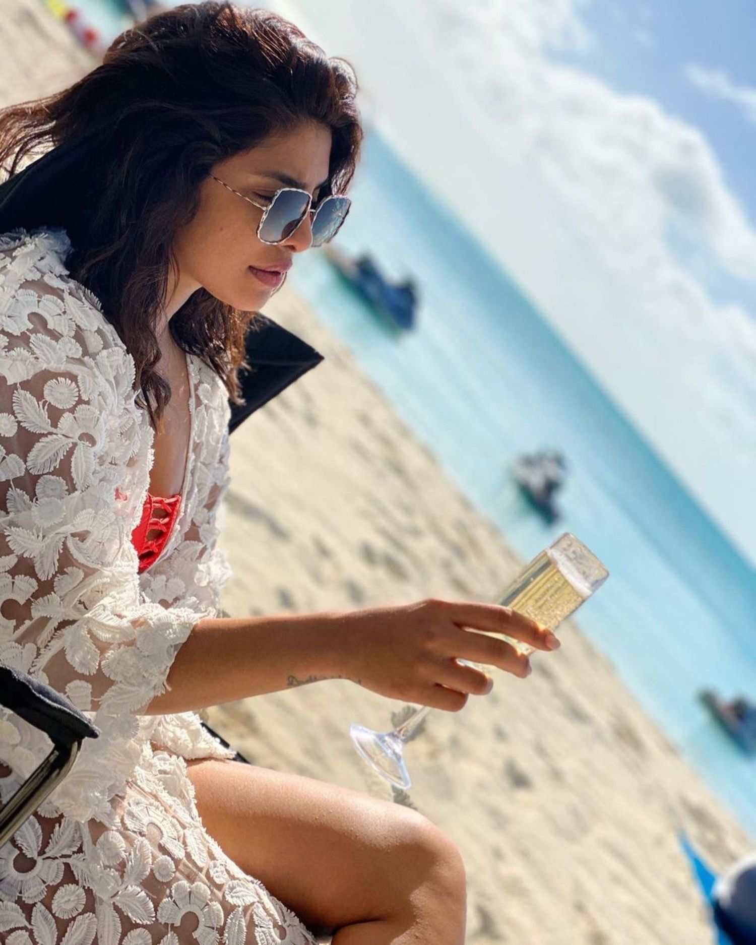 priyanka chopra beach dress Priyanka Chopra Jonas' beachside wardrobe had it all, from ruched  minidresses to striped bikinis