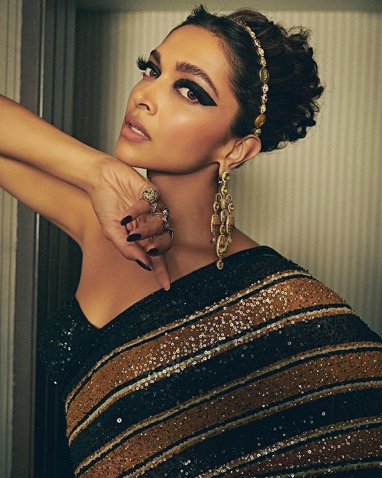 deepika padukone golden dress Cannes 2018: Deepika Padukone Is 3 Times A Charm, From Denim Diva To Golden Goddess