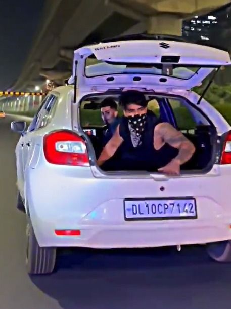 Farzi-like scenes at Gurugram! Two men throw notes on road from speeding car