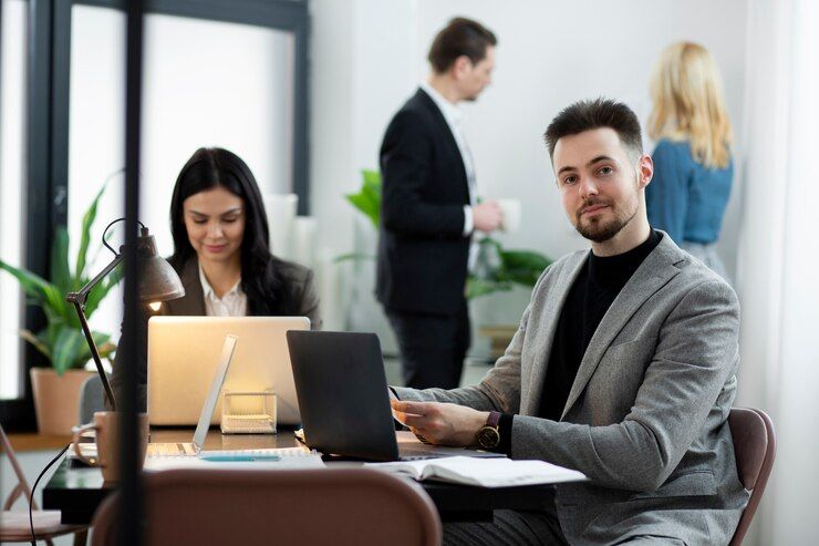 medium shot people working desk 23 2149300648