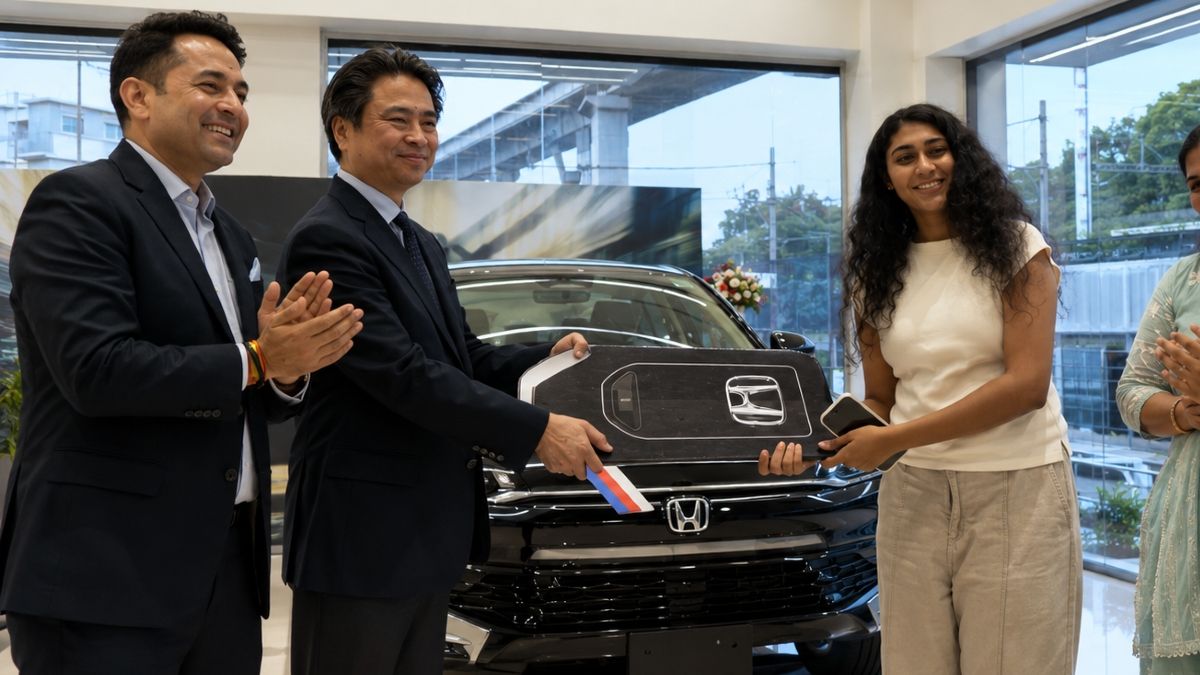 27 km/l Mileage Car Delivery Begins: CEO Hands Over Keys to Customer 27 km/l Mileage Car Delivery Begins: CEO Hands Over Keys to Customer